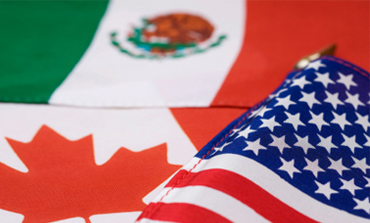 Flags of the three NAFTA member nations